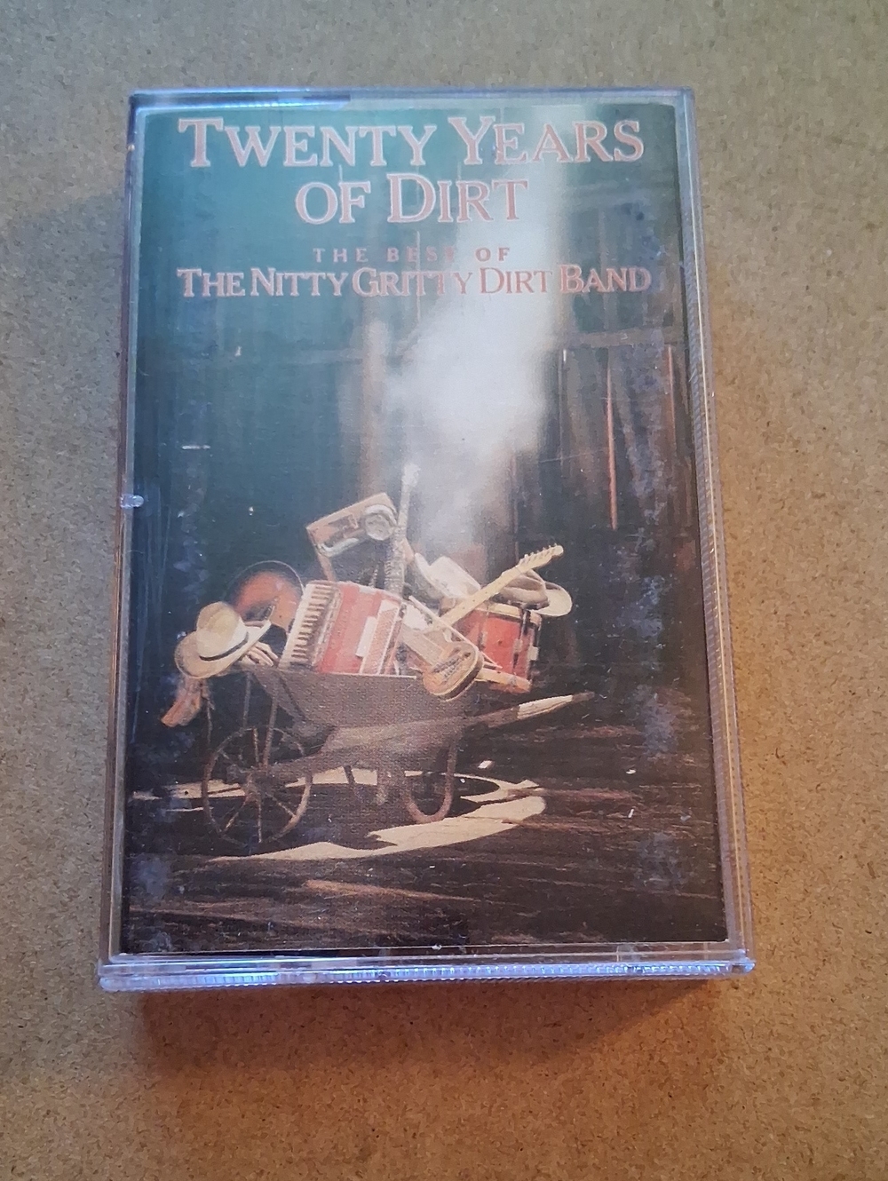 Twenty Years of Dirt - The Nitty Gritty Dirt Band Cassette (Black/Brown)